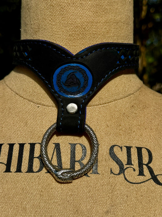 Nordic collar-  blue backing with blue stitching, black leather. Ouroboros ring