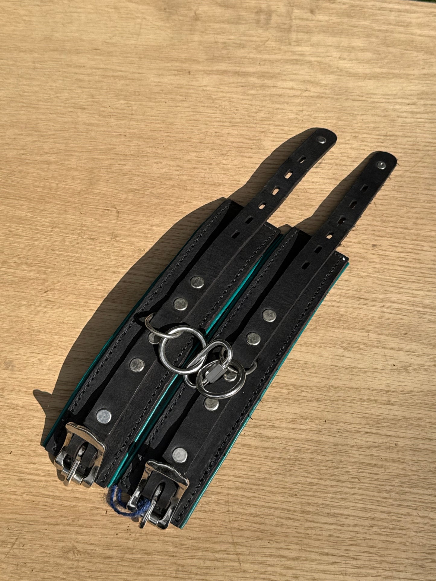 Solid single strap deep green padded kink cuffs ( a pair ) on sale. Reduced to $115