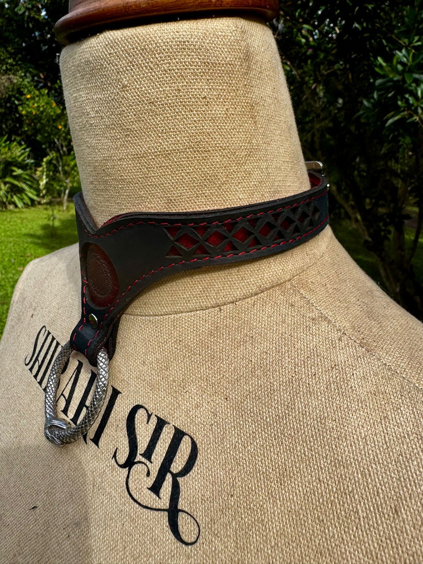 Ouroboros collar-  crimson metallic red with red stitching, black leather. Ouroboros ring