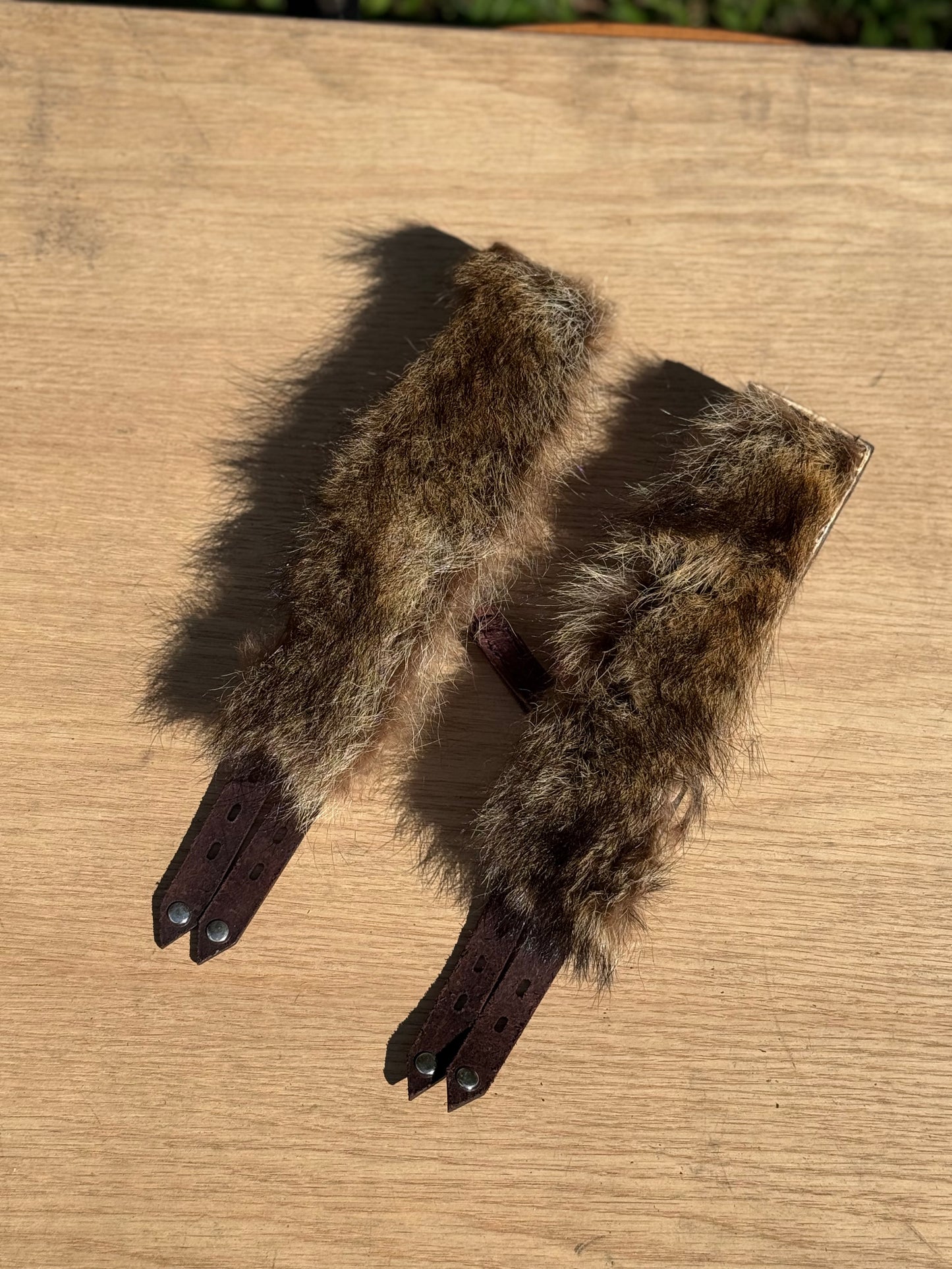 Raccoon fur lined padded kink cuffs ( a pair) on sale. Reduced to $145