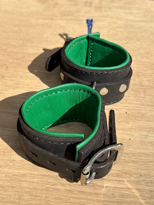 Solid single strap light green padded kink cuffs ( a pair ) on sale. Reduced to $115