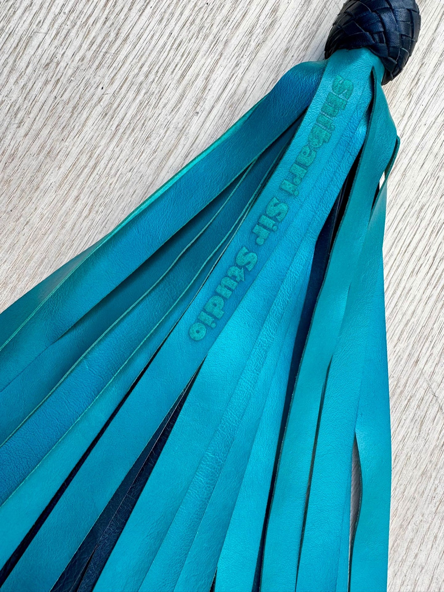 Standard teal flogger