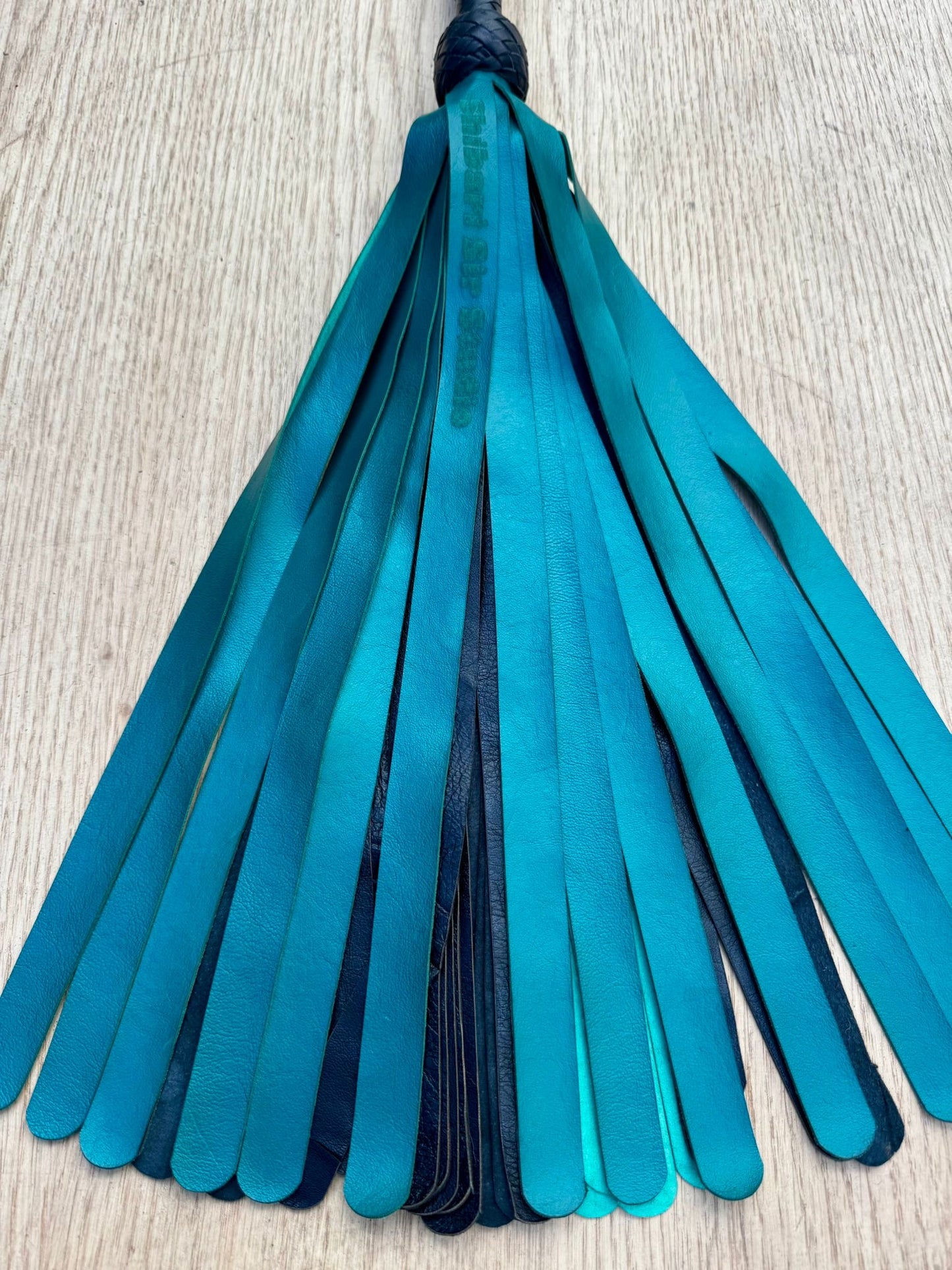 Standard teal flogger