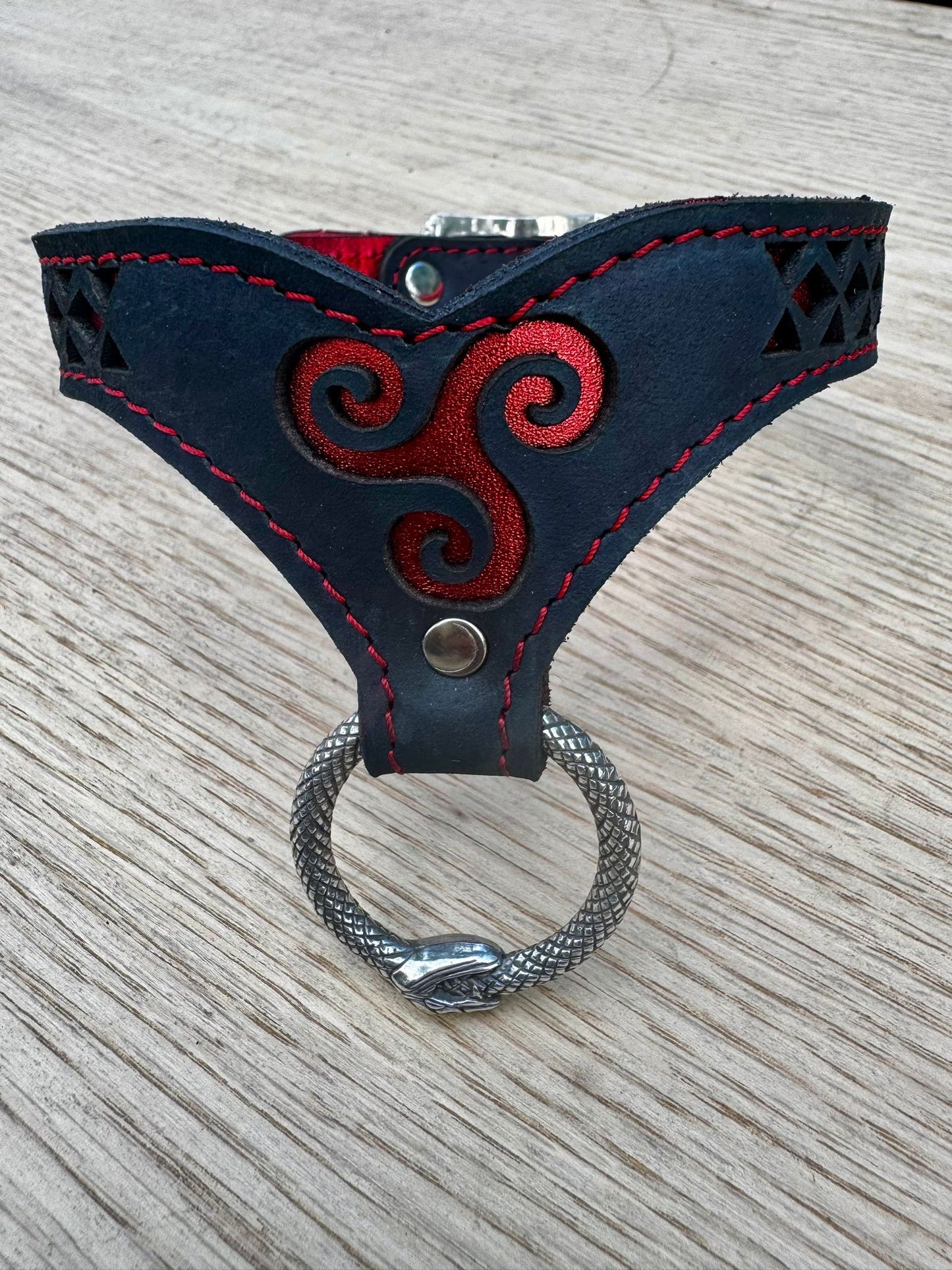 Triskelion collar-  crimson metallic red with red stitching, black leather. Ouroboros ring