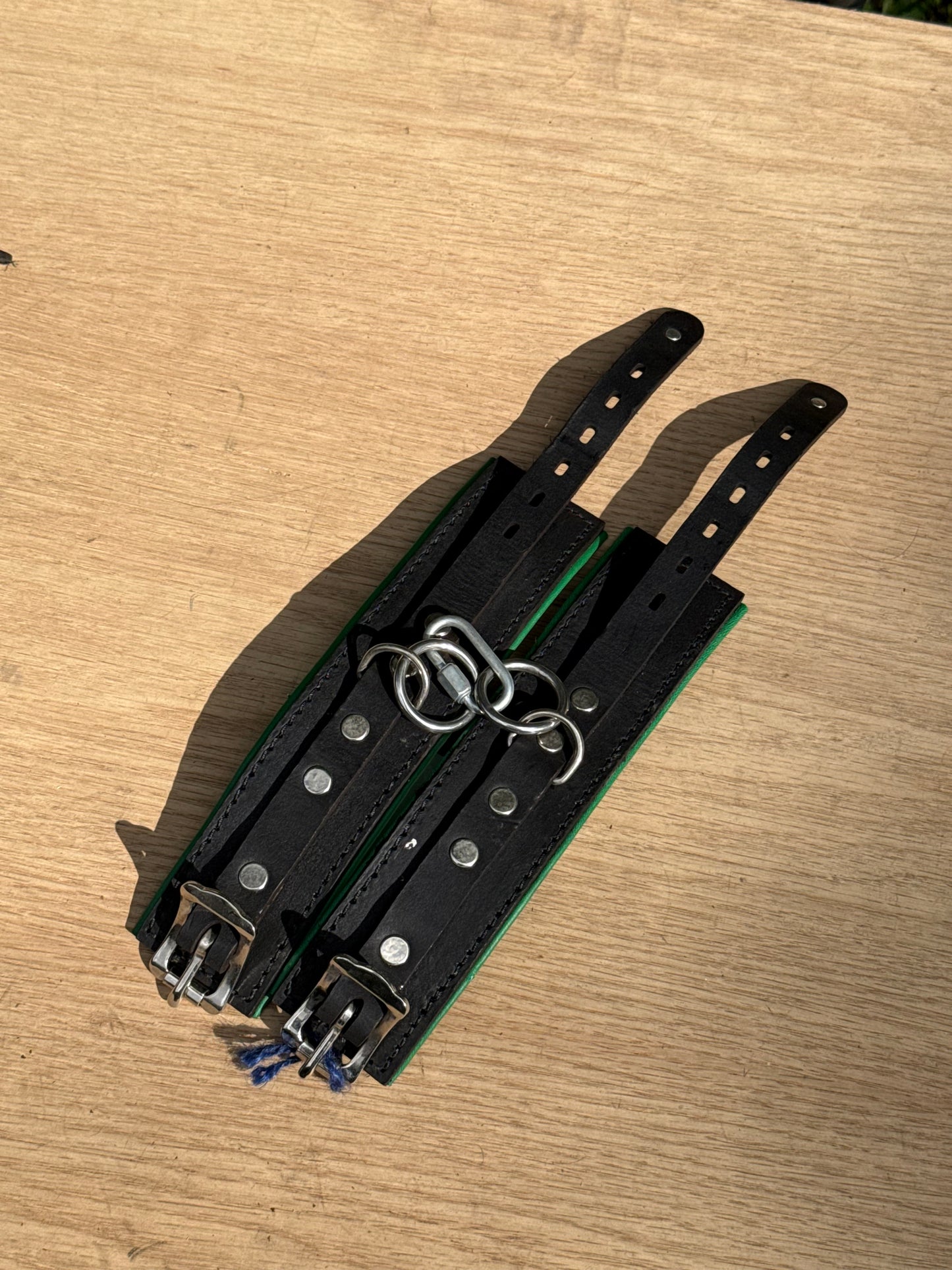 Solid single strap light green padded kink cuffs ( a pair ) on sale. Reduced to $115
