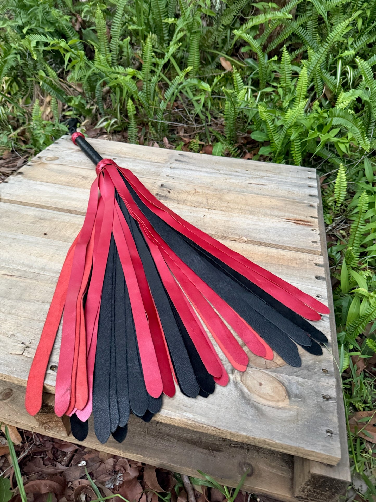 Extra long heavy weight red metalic flogger