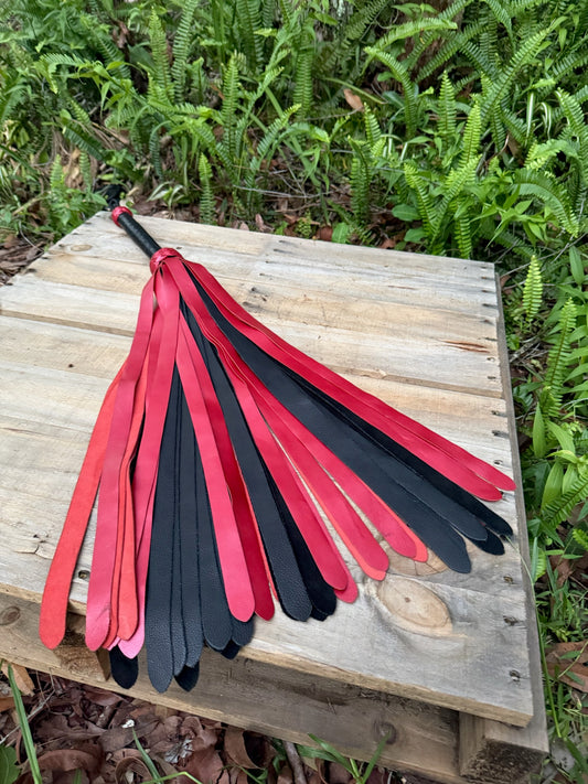Extra long heavy weight red metalic flogger