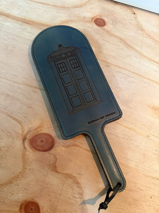 Blue police box paddle with metalic backing