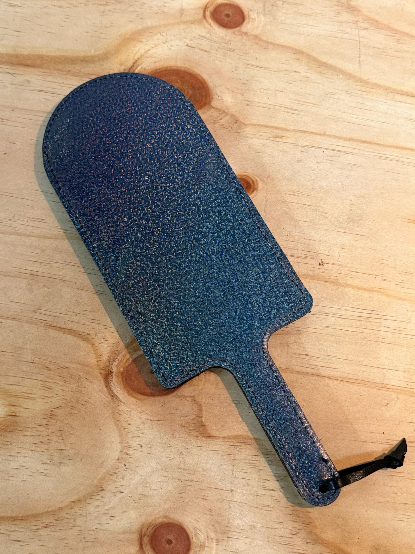 Blue police box paddle with metalic backing
